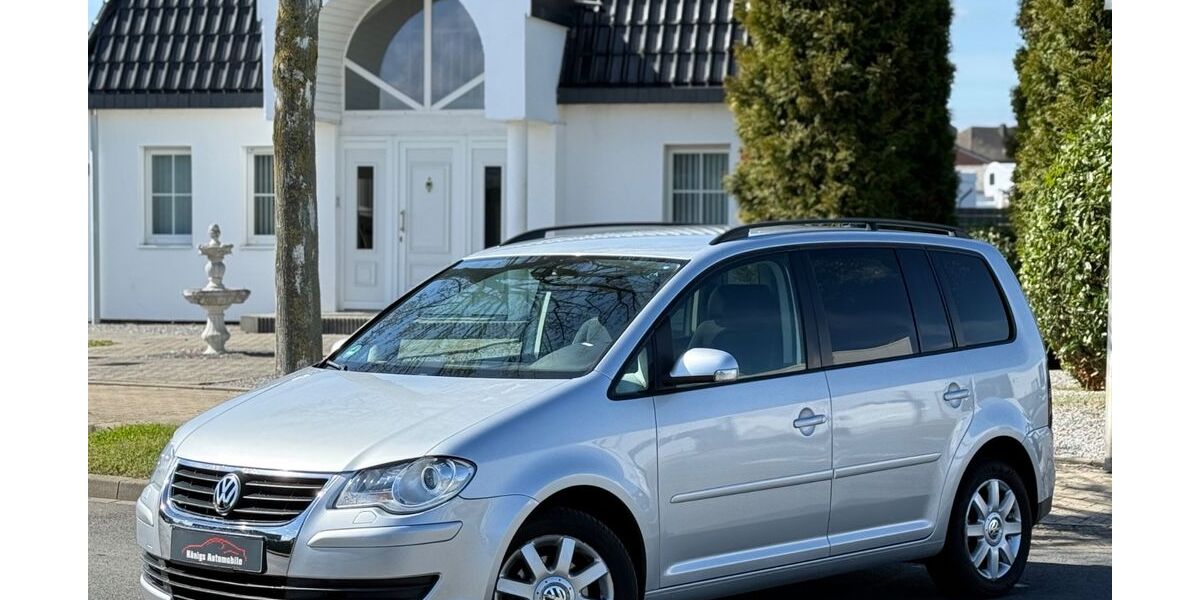 VW Touran 91.786 km 8.990 &euro; Jülich 52428