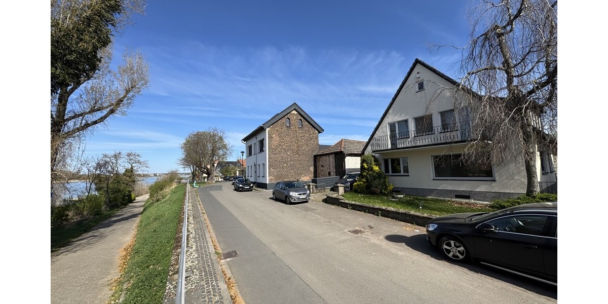 Rheinblick, Gartenidylle und Entwicklungspotential - Einfamilienhaus Köln Porz | Angebot:25783620