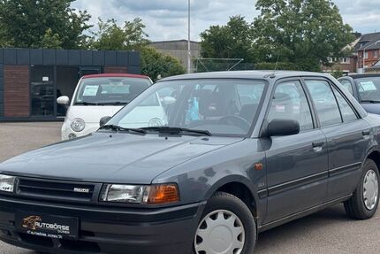 Mazda 323 64.963 km 1.999 &euro; Düren 52349